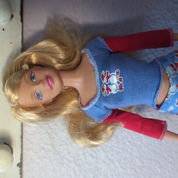Barbie Doll with Holiday Skating Penguin Pajamas and Hairbrush - Picture 2 of 4